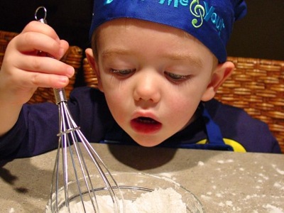 cooking boosts learning, chores develop maturity, hands-on learning in the kitchen,